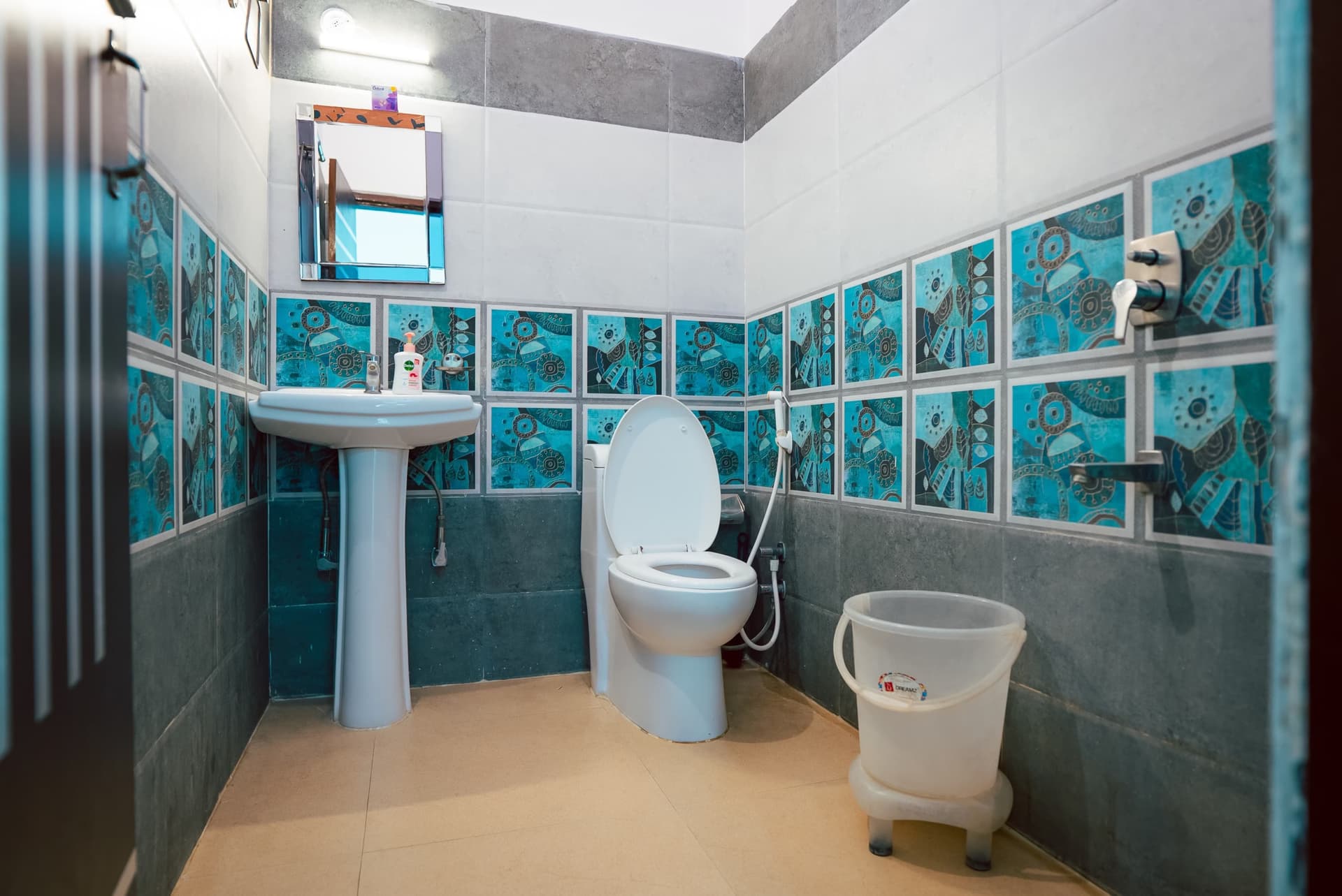 Clean attached washroom at Sriezaa Yogshala