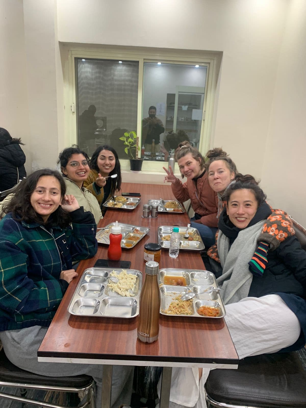 Yoga teacher students dining together at Sriezaa Yogshala
